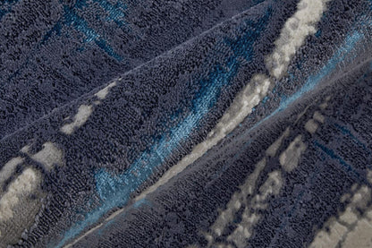 4' X 6' Ivory Blue And Gray Abstract Power Loom Distressed Area Rug