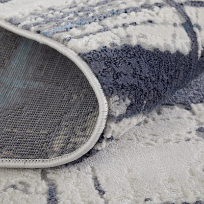 4' X 6' Ivory Blue And Gray Abstract Power Loom Distressed Area Rug