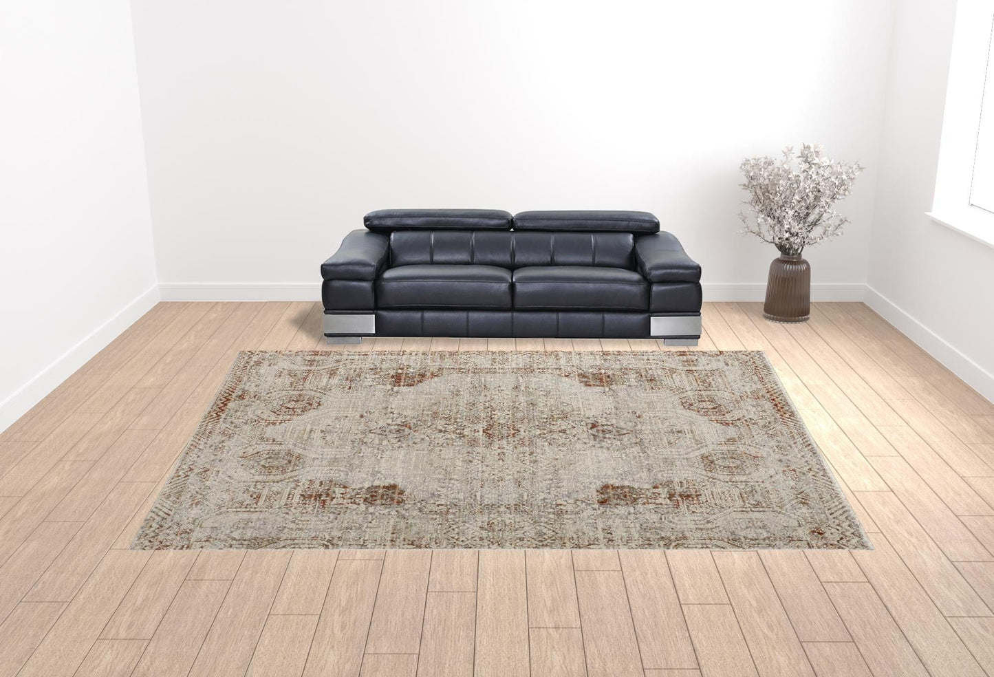 8' X 10' Tan Ivory And Orange Floral Power Loom Distressed Area Rug With Fringe