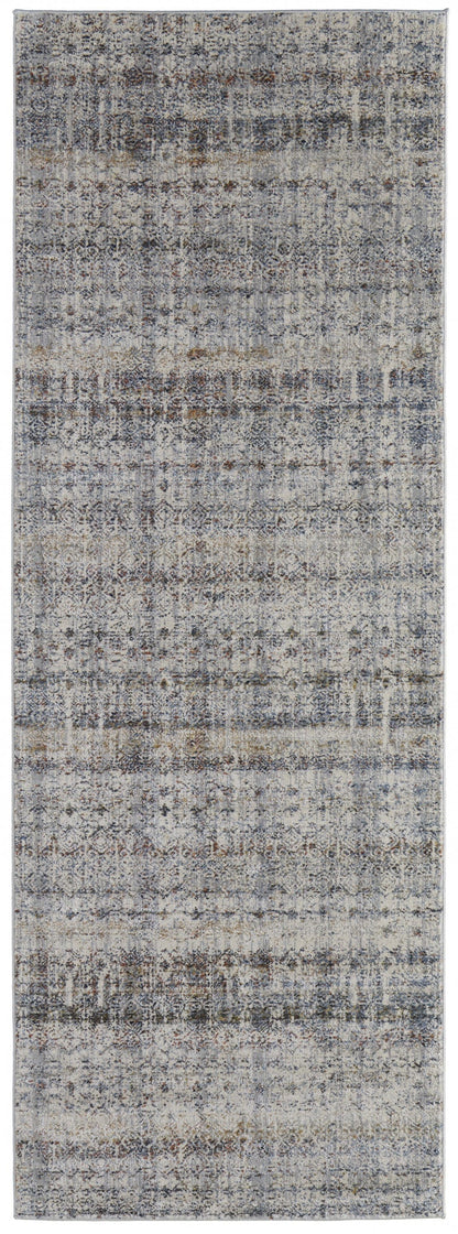 5' X 8' Tan Ivory And Blue Geometric Power Loom Distressed Area Rug With Fringe