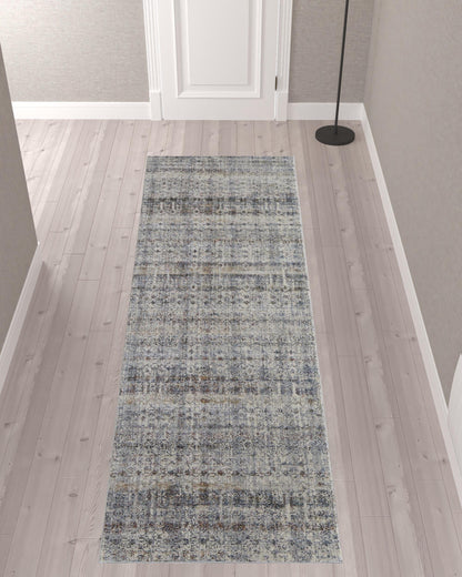 5' X 8' Tan Ivory And Blue Geometric Power Loom Distressed Area Rug With Fringe