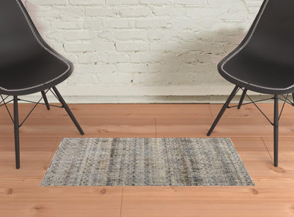 5' X 8' Tan Ivory And Blue Geometric Power Loom Distressed Area Rug With Fringe