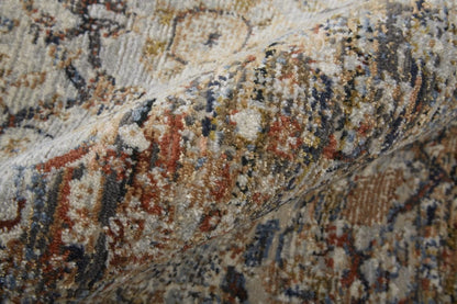 5' X 8' Tan Orange And Blue Floral Power Loom Distressed Area Rug With Fringe