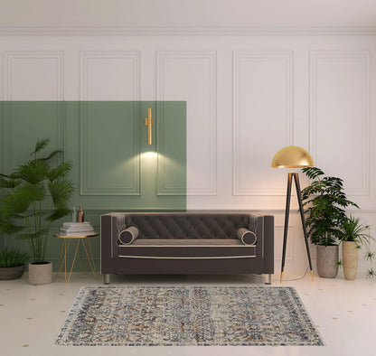 5' X 8' Tan Blue And Orange Floral Power Loom Distressed Area Rug With Fringe