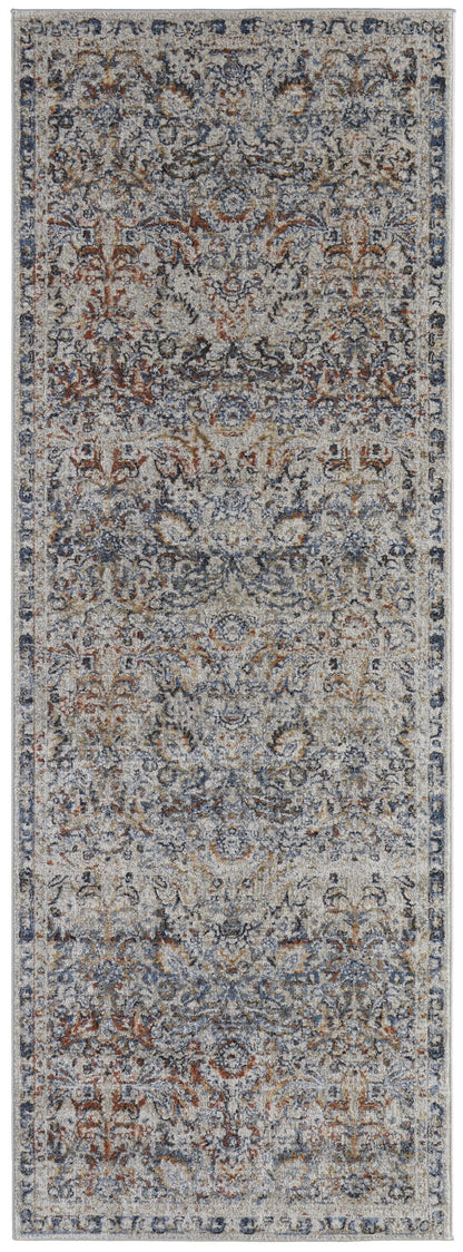 5' X 8' Tan Blue And Orange Floral Power Loom Distressed Area Rug With Fringe