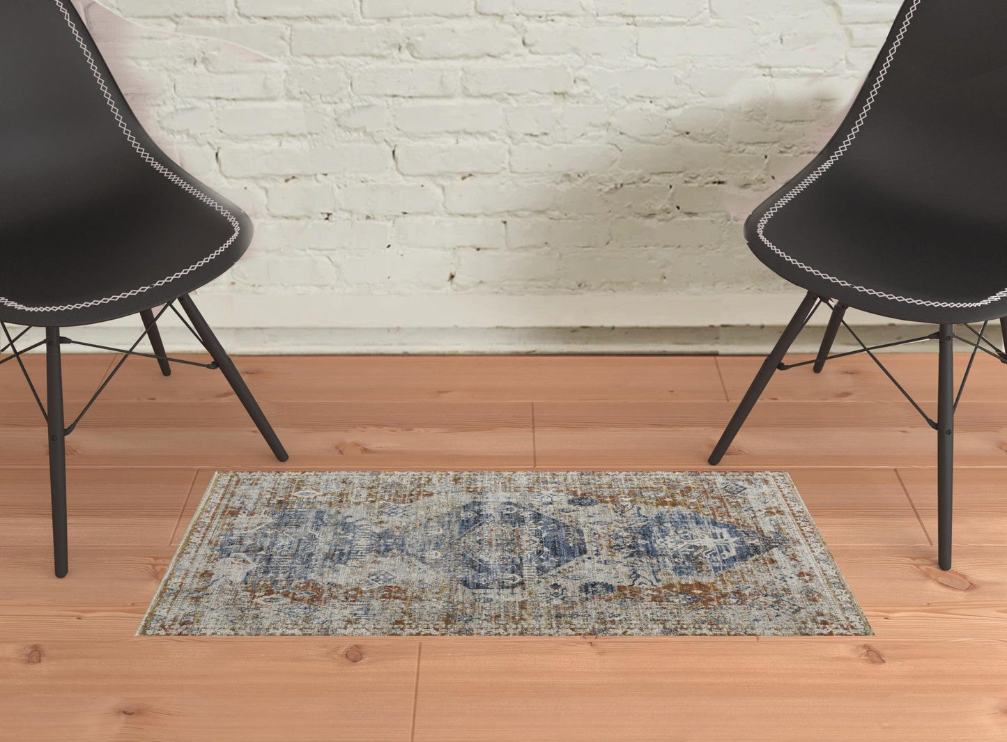 5' X 8' Ivory Orange And Blue Floral Power Loom Distressed Area Rug With Fringe