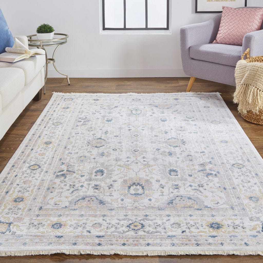 4' X 6' Tan Ivory And Blue Floral Stain Resistant Area Rug