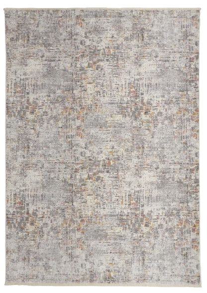 4' X 6' Ivory Tan And Taupe Abstract Stain Resistant Area Rug