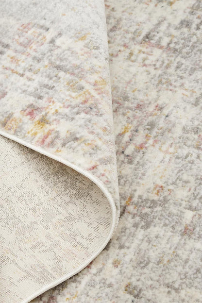 4' X 6' Ivory Tan And Taupe Abstract Stain Resistant Area Rug