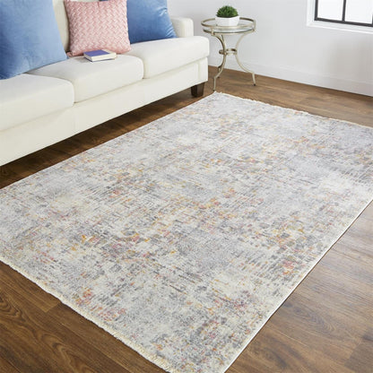 4' X 6' Ivory Tan And Taupe Abstract Stain Resistant Area Rug