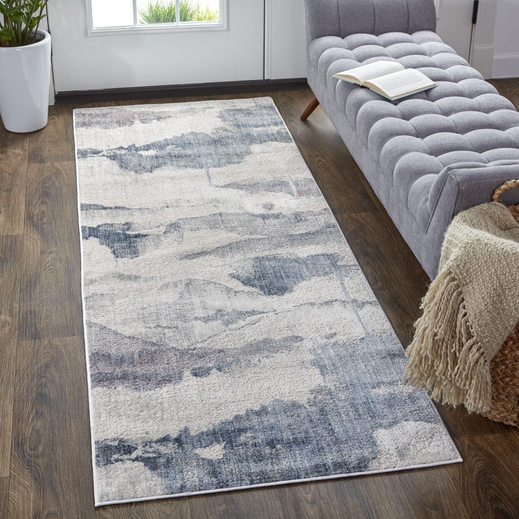 4' X 6' Ivory Blue And Pink Abstract Stain Resistant Area Rug