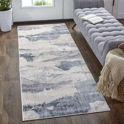 4' X 6' Ivory Blue And Pink Abstract Stain Resistant Area Rug