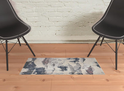 4' X 6' Ivory Blue And Pink Abstract Stain Resistant Area Rug