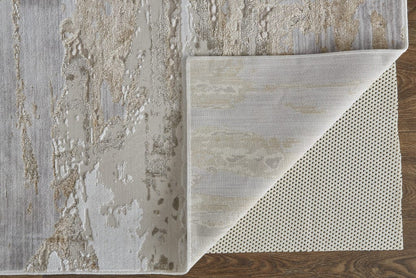 4' X 6' Tan Orange And Ivory Abstract Power Loom Distressed Area Rug