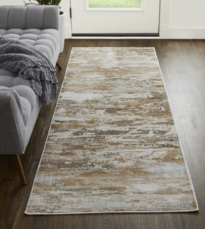 4' X 6' Tan Orange And Ivory Abstract Power Loom Distressed Area Rug
