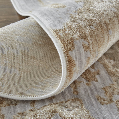 4' X 6' Tan Orange And Ivory Abstract Power Loom Distressed Area Rug