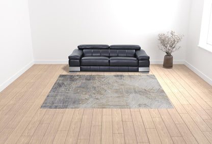 4' X 6' Tan Ivory And Gray Abstract Power Loom Distressed Area Rug