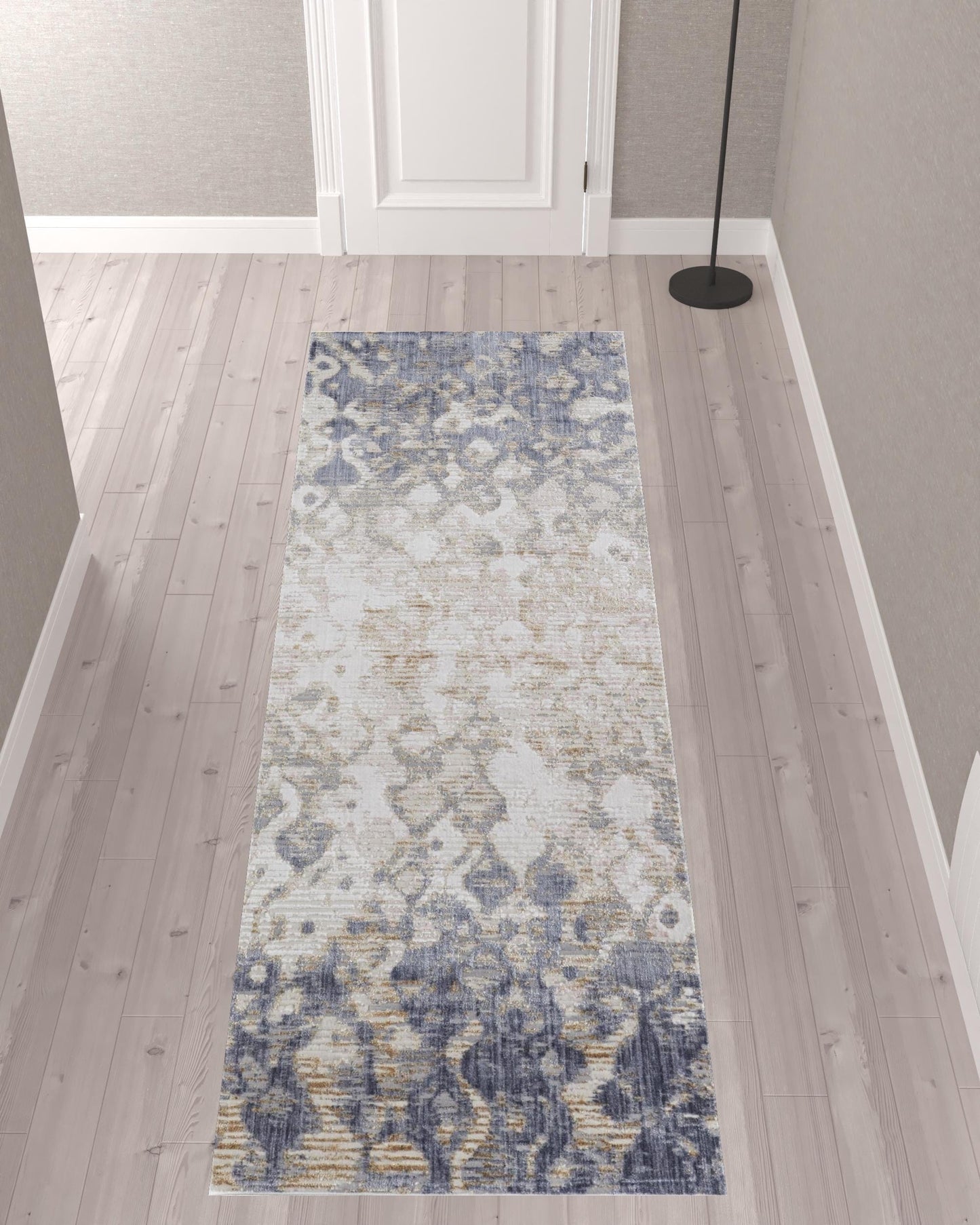 4' X 6' Tan Ivory And Blue Abstract Power Loom Distressed Area Rug