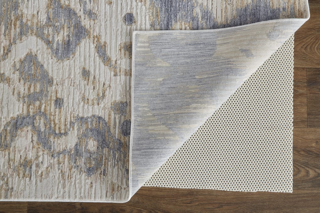 4' X 6' Tan Ivory And Blue Abstract Power Loom Distressed Area Rug