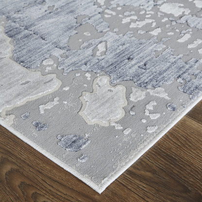 4' X 6' Ivory And Blue Abstract Power Loom Distressed Area Rug