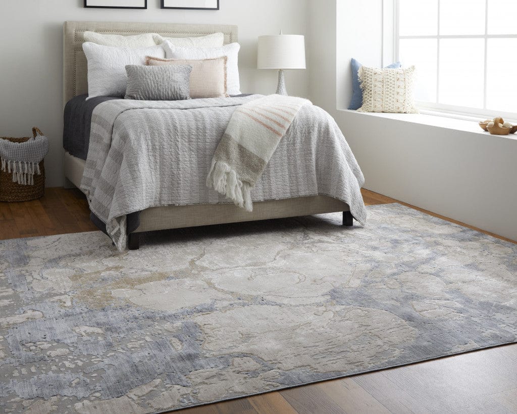 4' X 6' Ivory And Blue Abstract Power Loom Distressed Area Rug