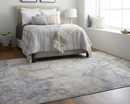 4' X 6' Ivory And Blue Abstract Power Loom Distressed Area Rug