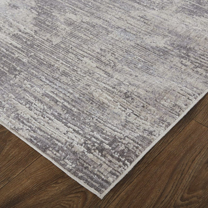 4' X 6' Tan Taupe And Gray Abstract Power Loom Distressed Stain Resistant Area Rug