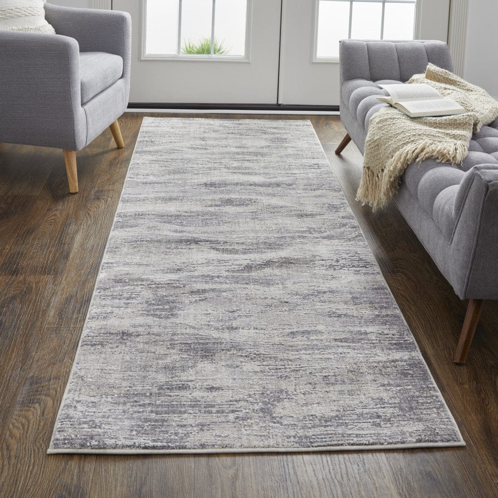 4' X 6' Tan Taupe And Gray Abstract Power Loom Distressed Stain Resistant Area Rug