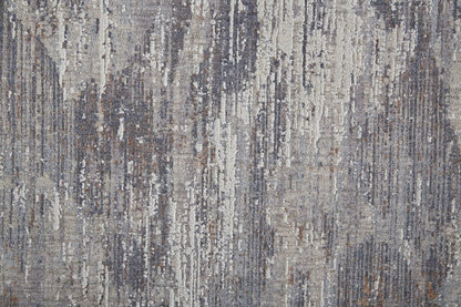 4' X 6' Tan Taupe And Gray Abstract Power Loom Distressed Stain Resistant Area Rug