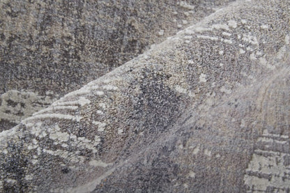 4' X 6' Taupe Tan And Blue Abstract Power Loom Distressed Stain Resistant Area Rug