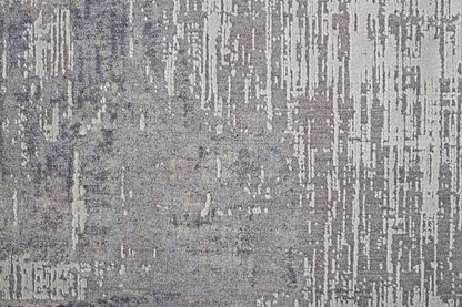 4' X 6' Taupe Tan And Blue Abstract Power Loom Distressed Stain Resistant Area Rug