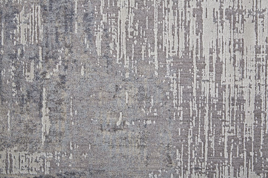 4' X 6' Taupe Tan And Blue Abstract Power Loom Distressed Stain Resistant Area Rug