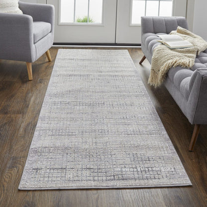 4' X 6' Taupe And Ivory Plaid Power Loom Distressed Stain Resistant Area Rug