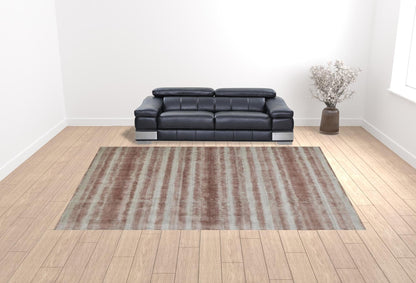 4' X 6' Tan Ivory And Pink Abstract Hand Woven Area Rug