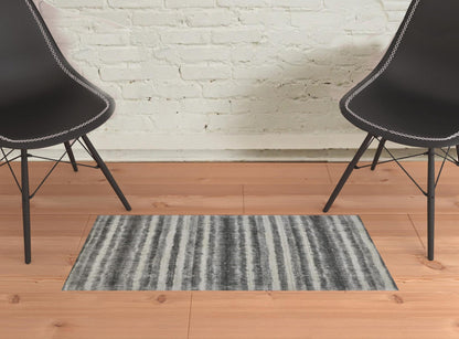 4' X 6' Tan Ivory And Pink Abstract Hand Woven Area Rug