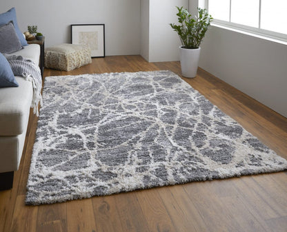 4' X 6' Gray And Ivory Abstract Power Loom Stain Resistant Area Rug