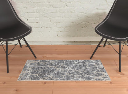 4' X 6' Gray And Ivory Abstract Power Loom Stain Resistant Area Rug