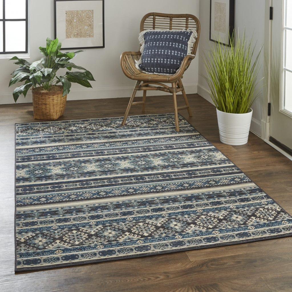 4' X 6' Blue Tan And Black Geometric Power Loom Distressed Stain Resistant Area Rug