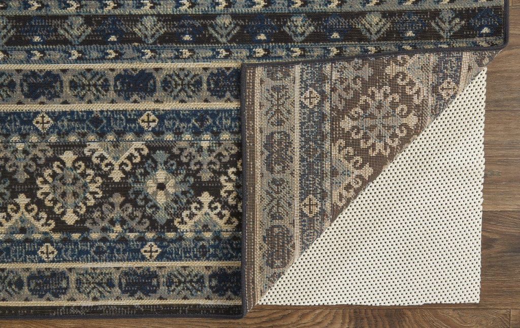 4' X 6' Blue Tan And Black Geometric Power Loom Distressed Stain Resistant Area Rug
