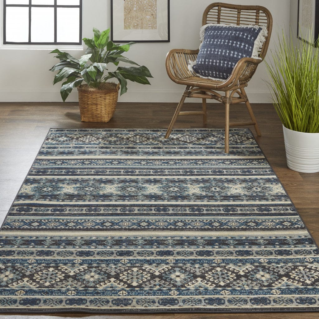 4' X 6' Blue Tan And Black Geometric Power Loom Distressed Stain Resistant Area Rug