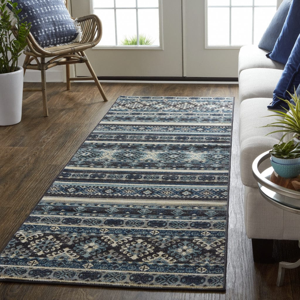 4' X 6' Blue Tan And Black Geometric Power Loom Distressed Stain Resistant Area Rug