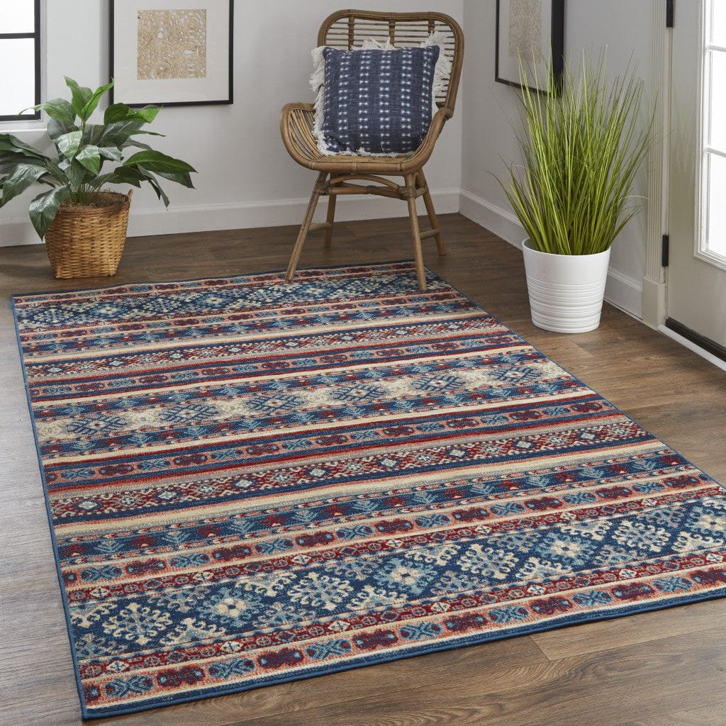 4' X 6' Blue Tan And Black Geometric Power Loom Distressed Stain Resistant Area Rug