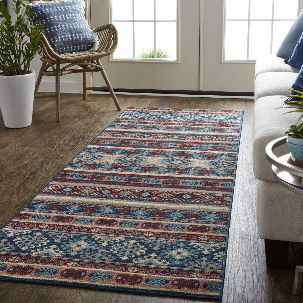 4' X 6' Blue Tan And Black Geometric Power Loom Distressed Stain Resistant Area Rug