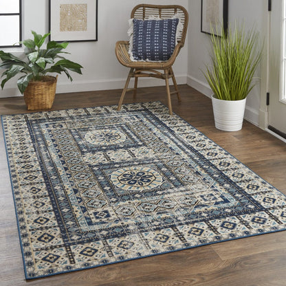 4' X 6' Ivory Tan And Blue Abstract Power Loom Distressed Stain Resistant Area Rug