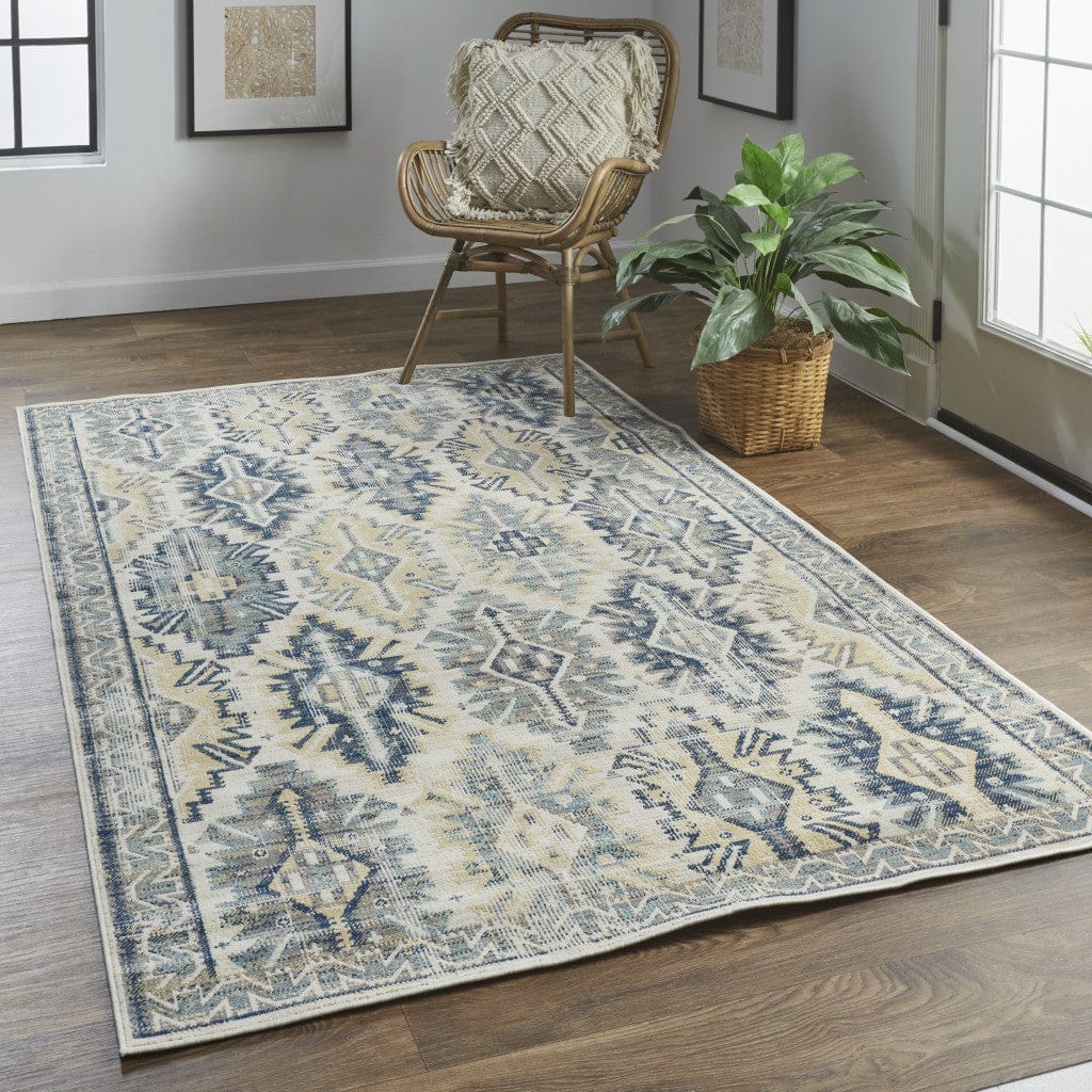 4' X 6' Green Blue And Ivory Abstract Power Loom Distressed Stain Resistant Area Rug