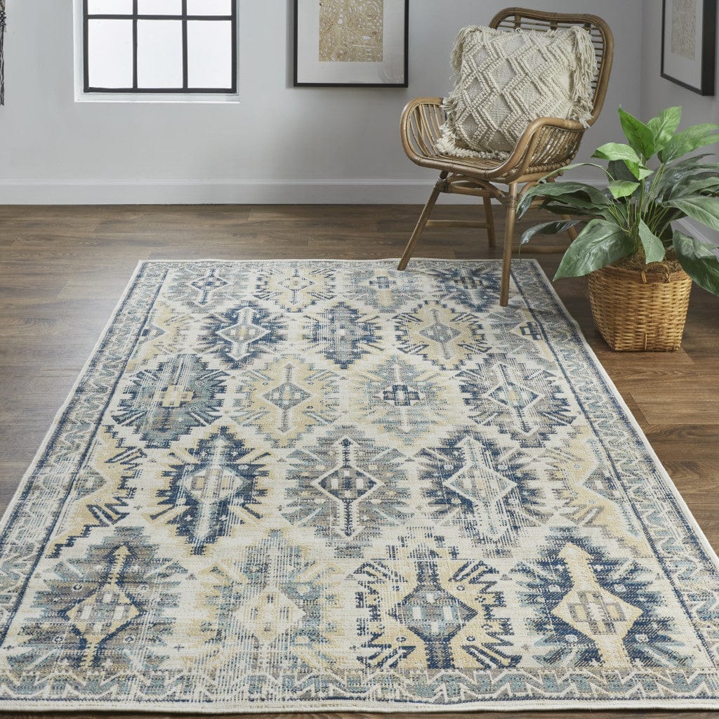 4' X 6' Green Blue And Ivory Abstract Power Loom Distressed Stain Resistant Area Rug
