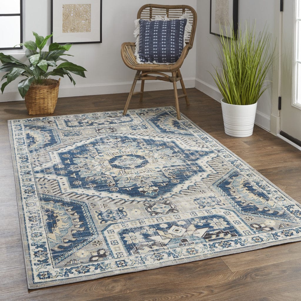 4' X 6' Blue And Ivory Abstract Power Loom Distressed Stain Resistant Area Rug