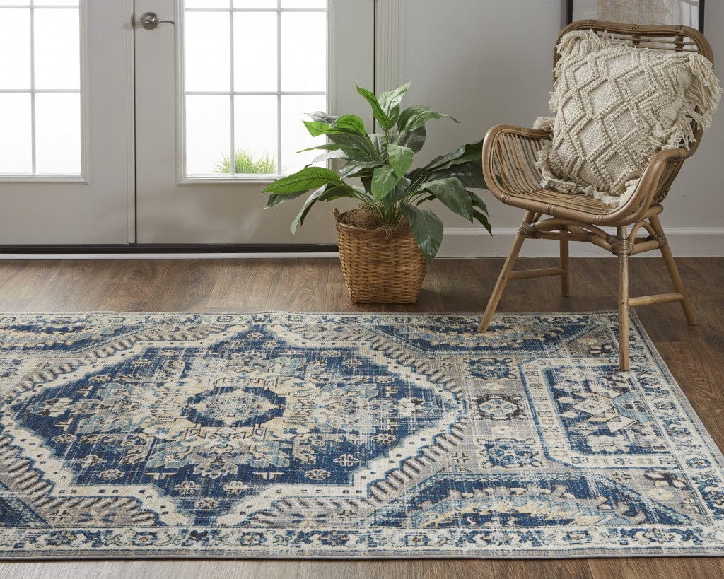 4' X 6' Blue And Ivory Abstract Power Loom Distressed Stain Resistant Area Rug