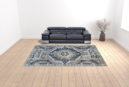 4' X 6' Blue And Ivory Abstract Power Loom Distressed Stain Resistant Area Rug