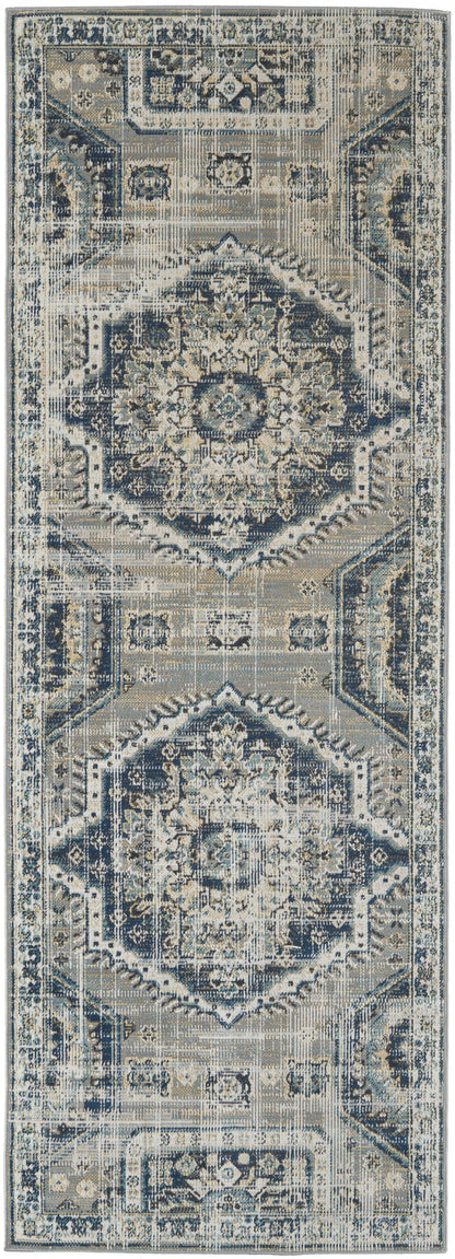 4' X 6' Blue And Ivory Abstract Power Loom Distressed Stain Resistant Area Rug